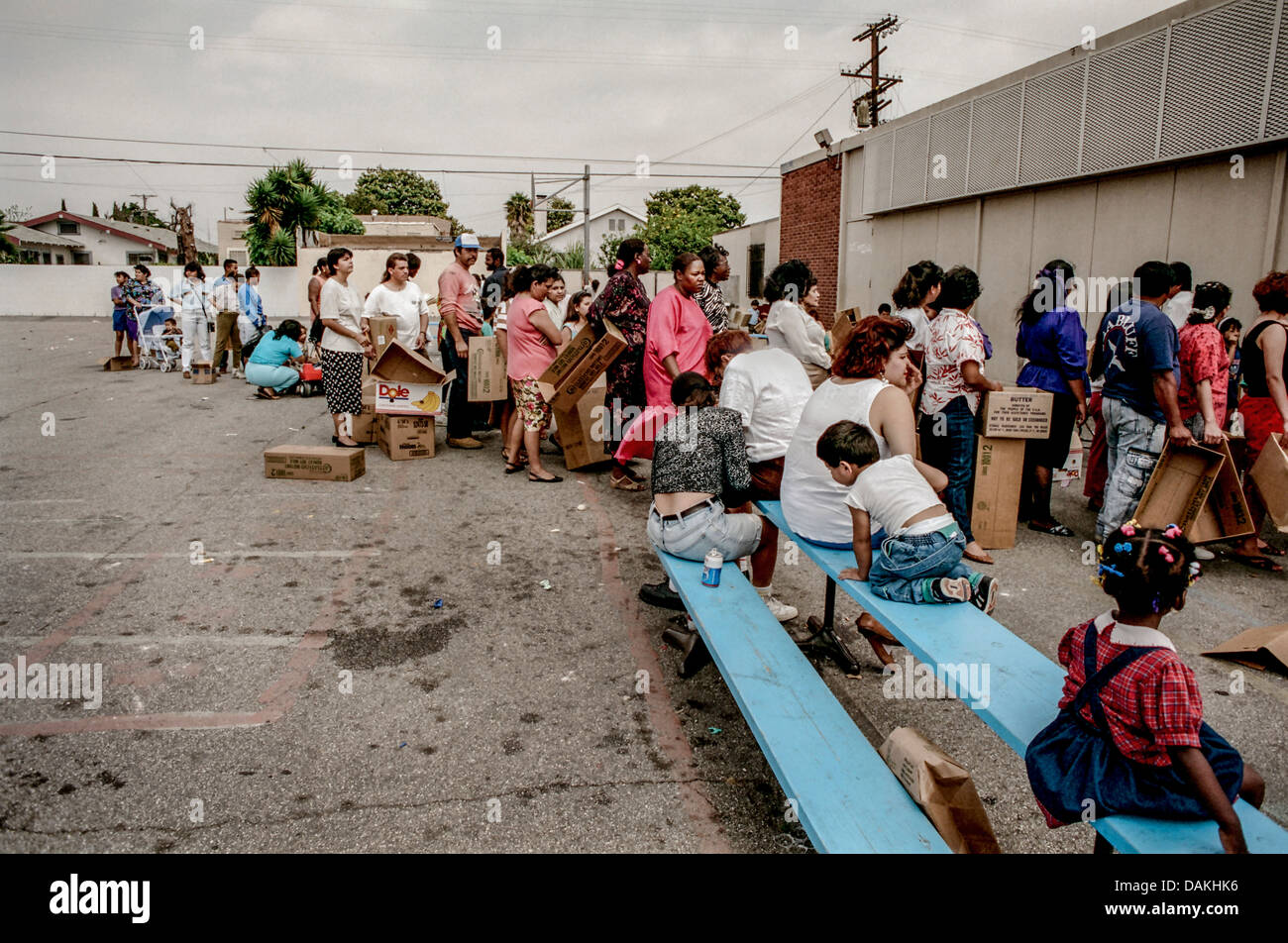 Hungry Hispanic and African American local LA residents line up for free  charity food after the 1992 Rodney King race riots Stock Photo - Alamy, image size:1300x952