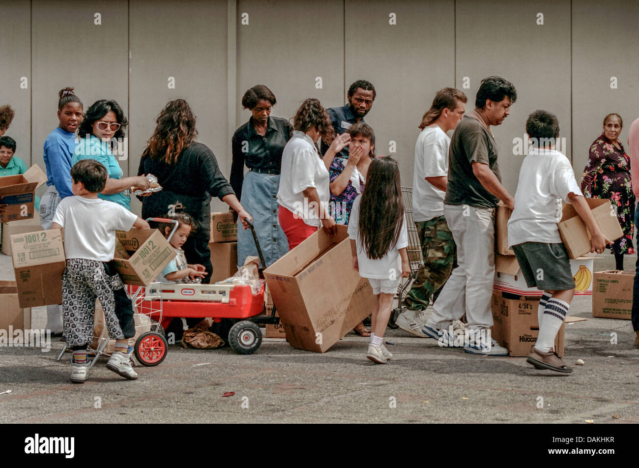 Hungry Hispanic and African American local LA residents line up for free  charity food after the 1992 Rodney King race riots Stock Photo - Alamy, image size:1300x952