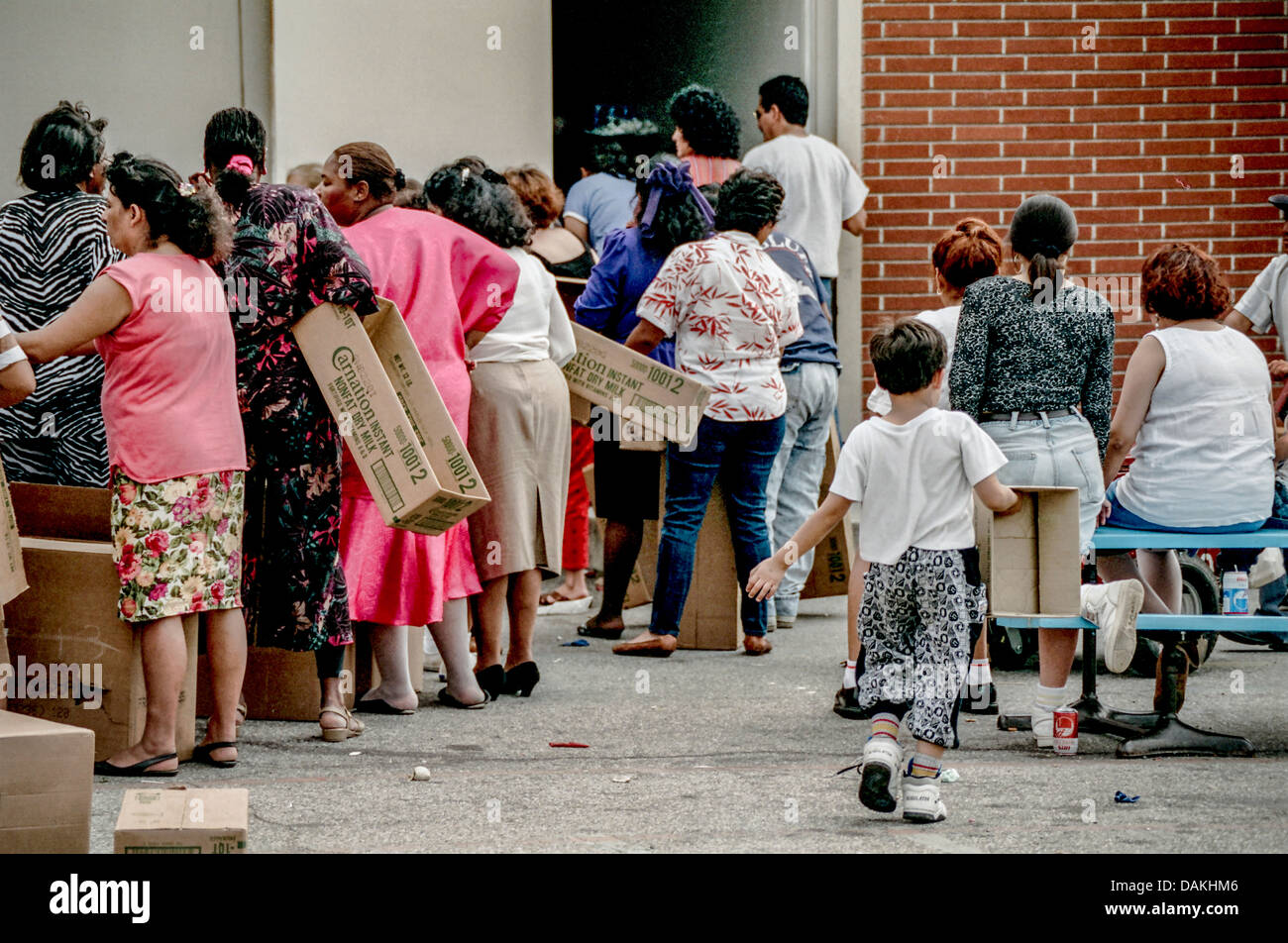 Hungry Hispanic and African American local LA residents line up for free  charity food after the 1992 Rodney King race riots Stock Photo - Alamy, image size:1300x952