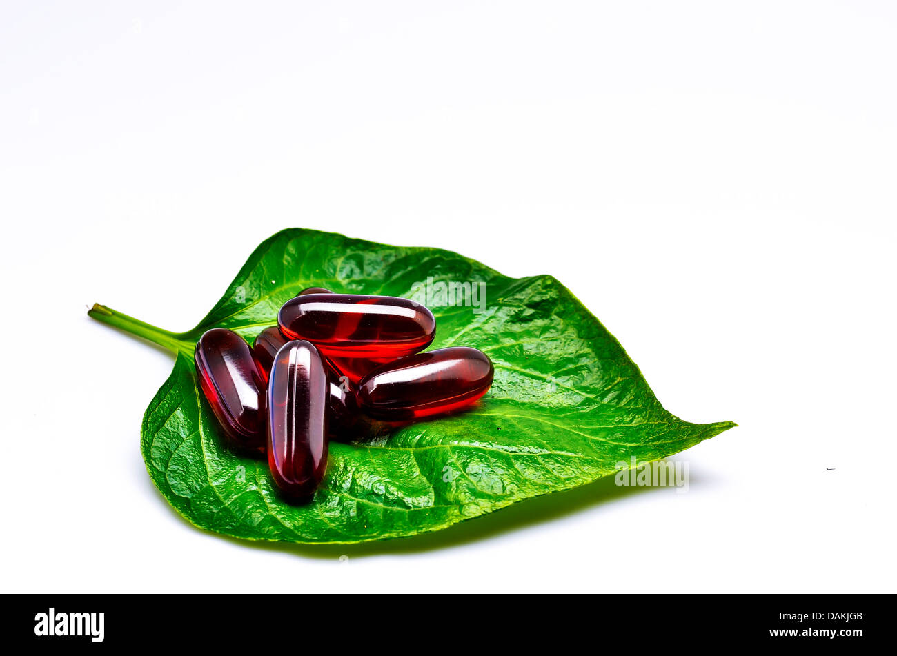 vitamins on green leaf Stock Photo