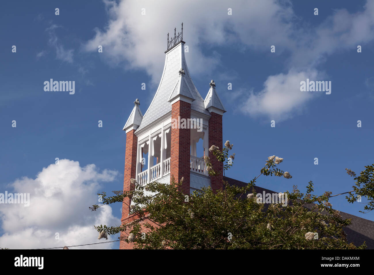 Red brick and tin shingle roof of the steeple on the historic United