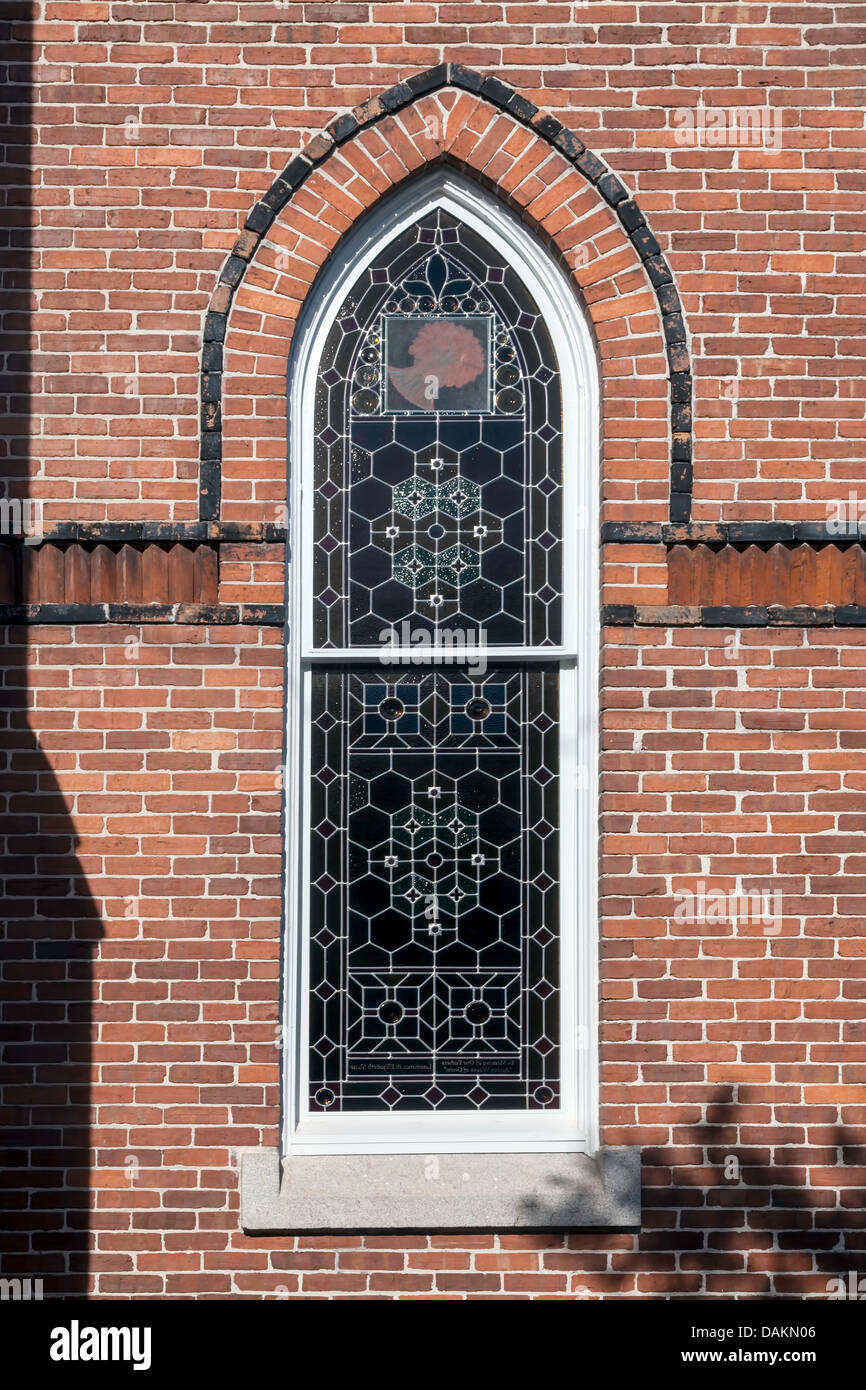 Arched stained glass window from the historic United Methodist Church