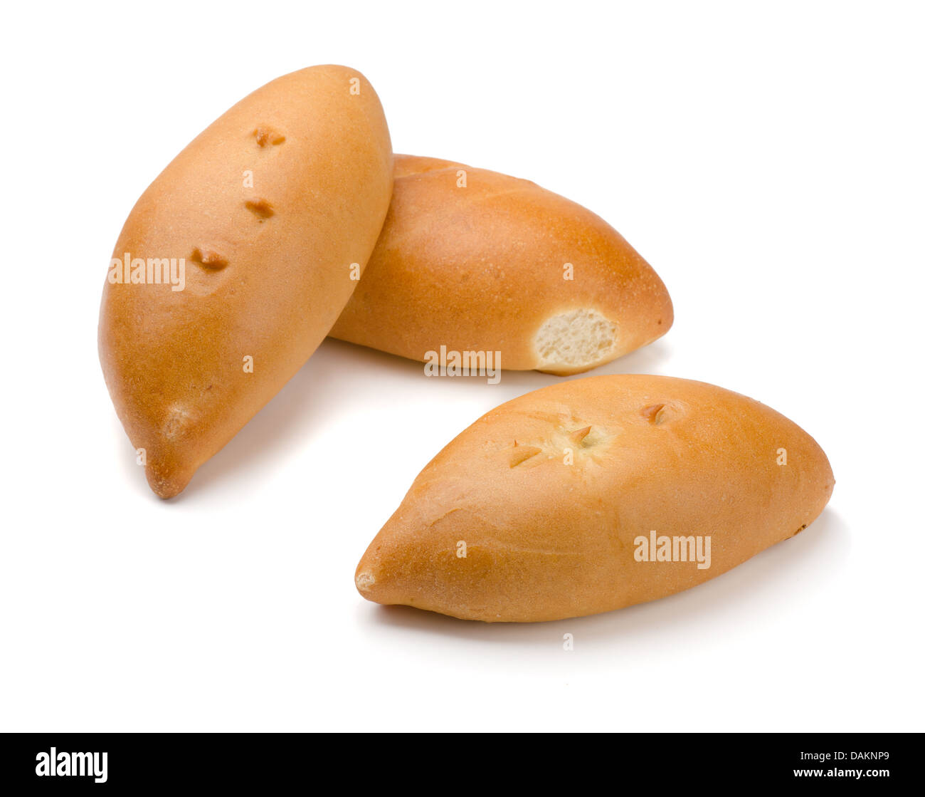 Fresh baked russian pastry pirozhki isolated on white Stock Photo