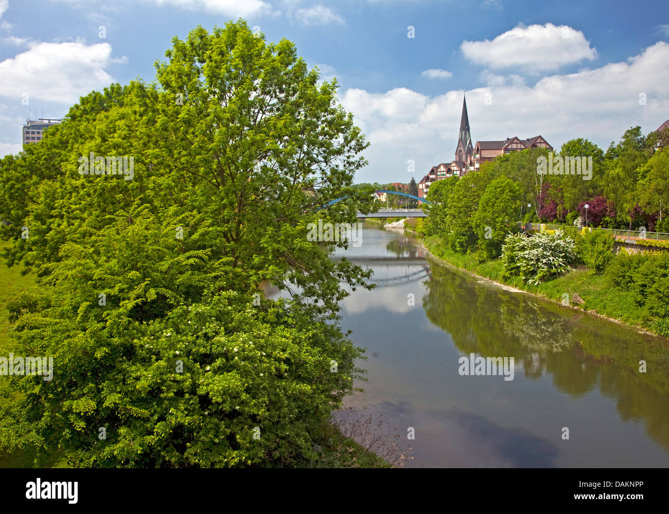 view along river Lippe to the Lippe bridge and the St. Mary's Church, Germany, North Rhine-Westphalia, Luenen Stock Photo