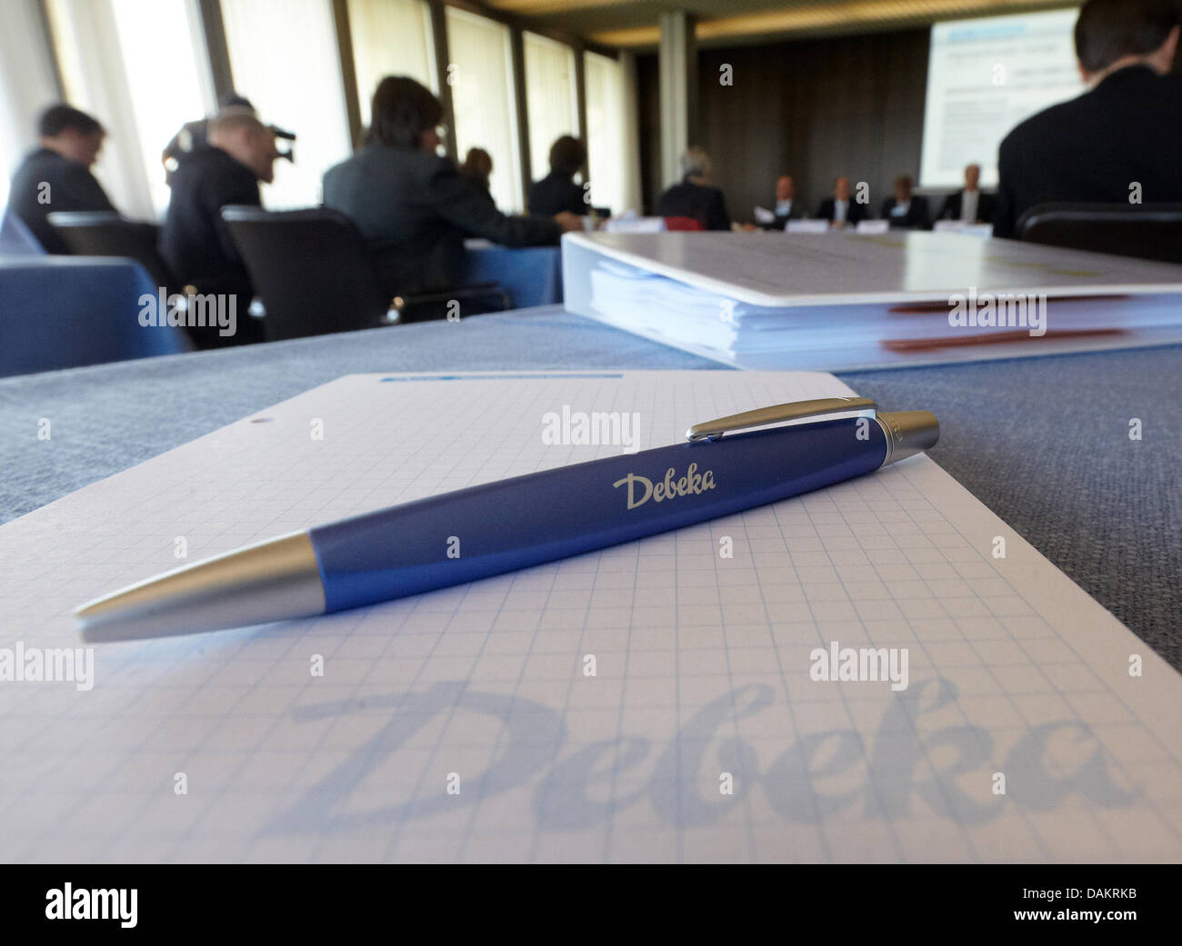 A pen and paper with the Debeka logo are pictured during the balance press conference of the ensurance company Debeka in Koblenz, Germany, 4 May 2011. Thanks to good trade with private health insurance companies, Debeka group were able to increase their annual turnover to 12 billion Euro which means an increase by 4.2 per cent in comparison to the year before. Photo: Thomas Frey Stock Photo