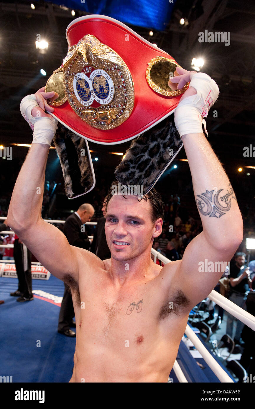 The Australian boxer Daniel Geale celebrates after the IBF World Championship fight against Sebastian in Neubrandenburg, Germany, 07 May 2011. won by points and is new IBF World Champion.