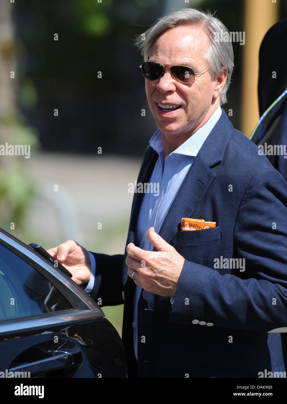US fashion designer Tommy Hilfiger gets in his car after his visit to the  Akademie JAK for fashion design in Hamburg, Germany, 09 May 2011. Hilfiger  discussed his typical 