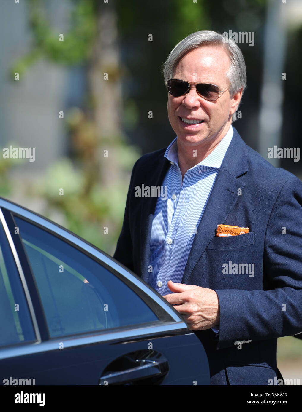 US fashion designer Tommy Hilfiger gets in his car after his visit to the  Akademie JAK for fashion design in Hamburg, Germany, 09 May 2011. Hilfiger  discussed his typical "preppy style" with