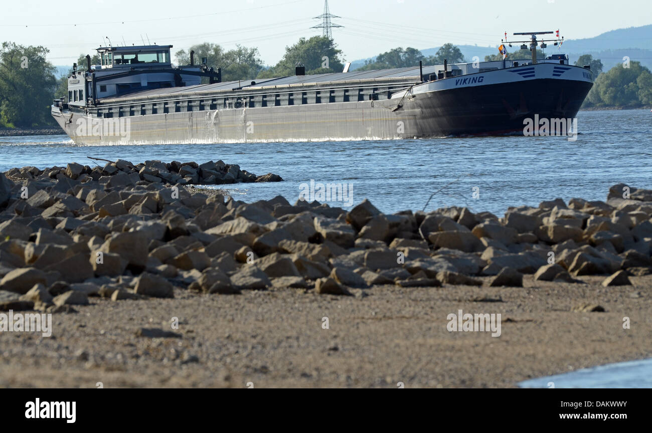 Abn inland freight ship steers on the Danube which currently has low tide in Bogen, Germany, 9 May 2011. The low tide of the Danube caused by very little rain currently constricts the waterway transport. Photo: Armin Weigel Stock Photo