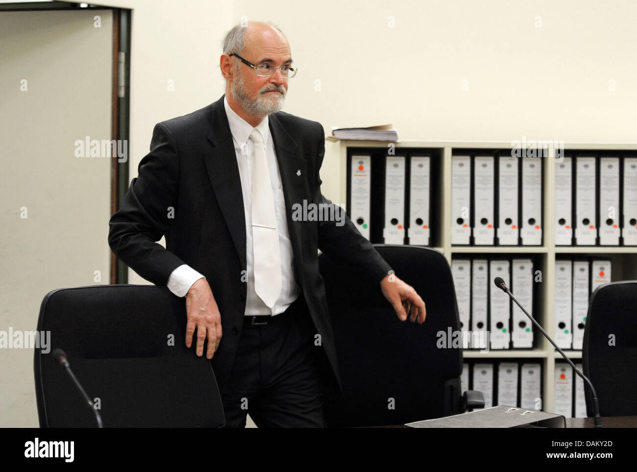 The judge of the Demjanjuk trial, Ralph Alt, arrives at the district court in Munich, Germany, 12 May 2011. The court is expected to pronounce its sentence against former guard of the German extermination camp Sobibor, US citizen John 'Ivan' Demjanjuk. Demjanjuk is accused of complicity in murder in 27.900 cases: he is said to have taken part in the extermination of Jews in summer  Stock Photo