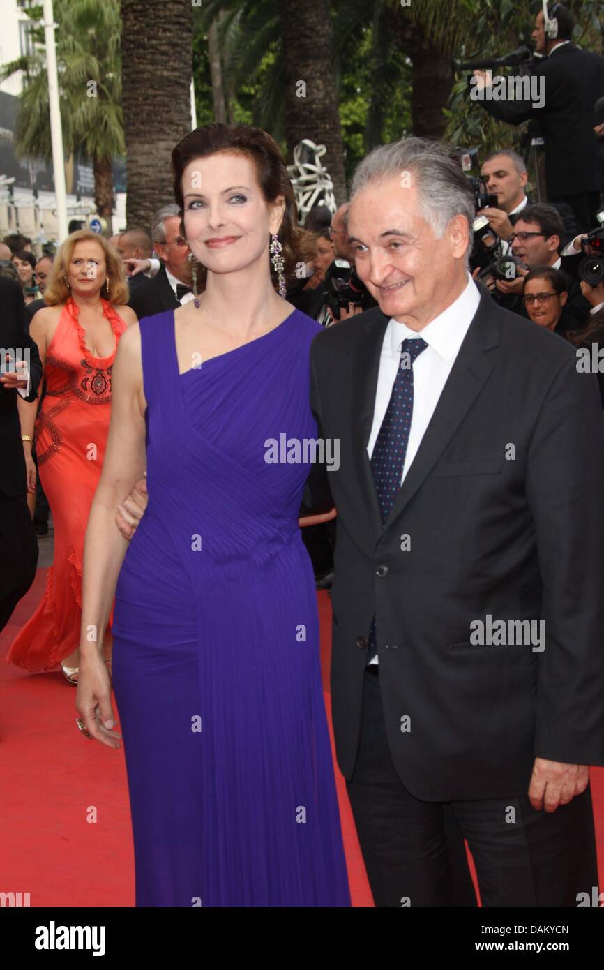 French actress Carole Bouquet and guest arrive at the premiere of 'Sleeping Beauty' at the 64th Cannes International Film Festival at Palais des Festivals in Cannes, France, 12 May 2011. Photo: Hubert Boesl Stock Photo