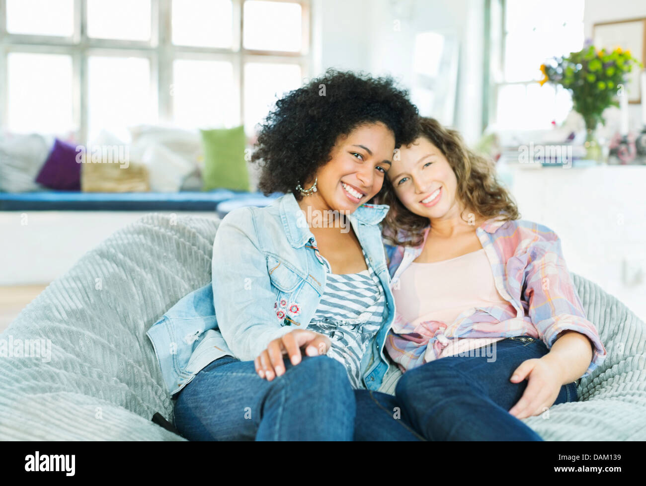 Female sitting on chair hi-res stock photography and images - Alamy
