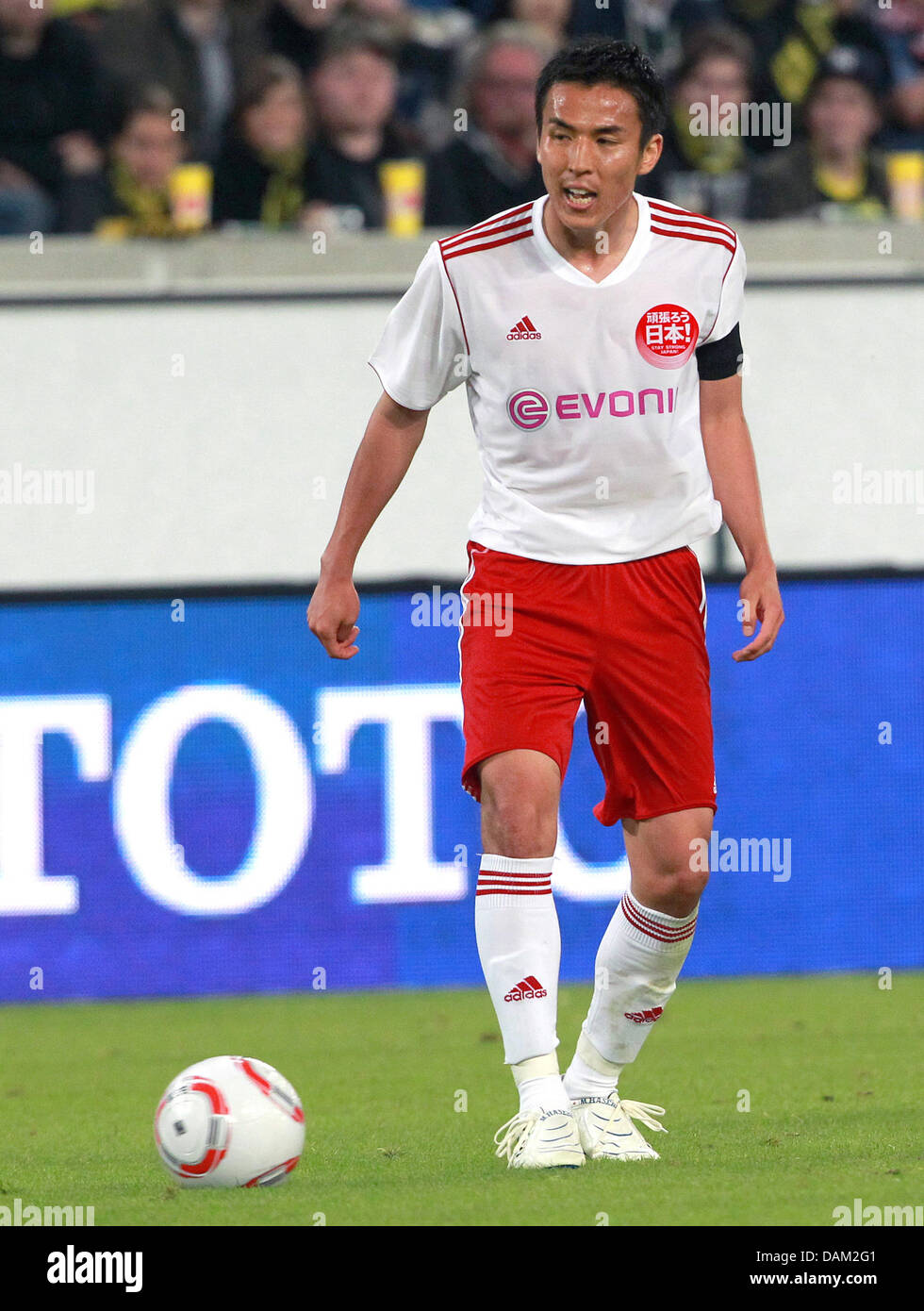 Japanese player Makoto Hasebe is pictured during the friendly match between Borussia Dortmund and Team Japan initiated as benefit event for victims of the recent earthquake in Japan at the Schauinsland-Reisen-Arena in Duesburg, Germany, 17 May 2011. Photo: Roland Weihrauch Stock Photo