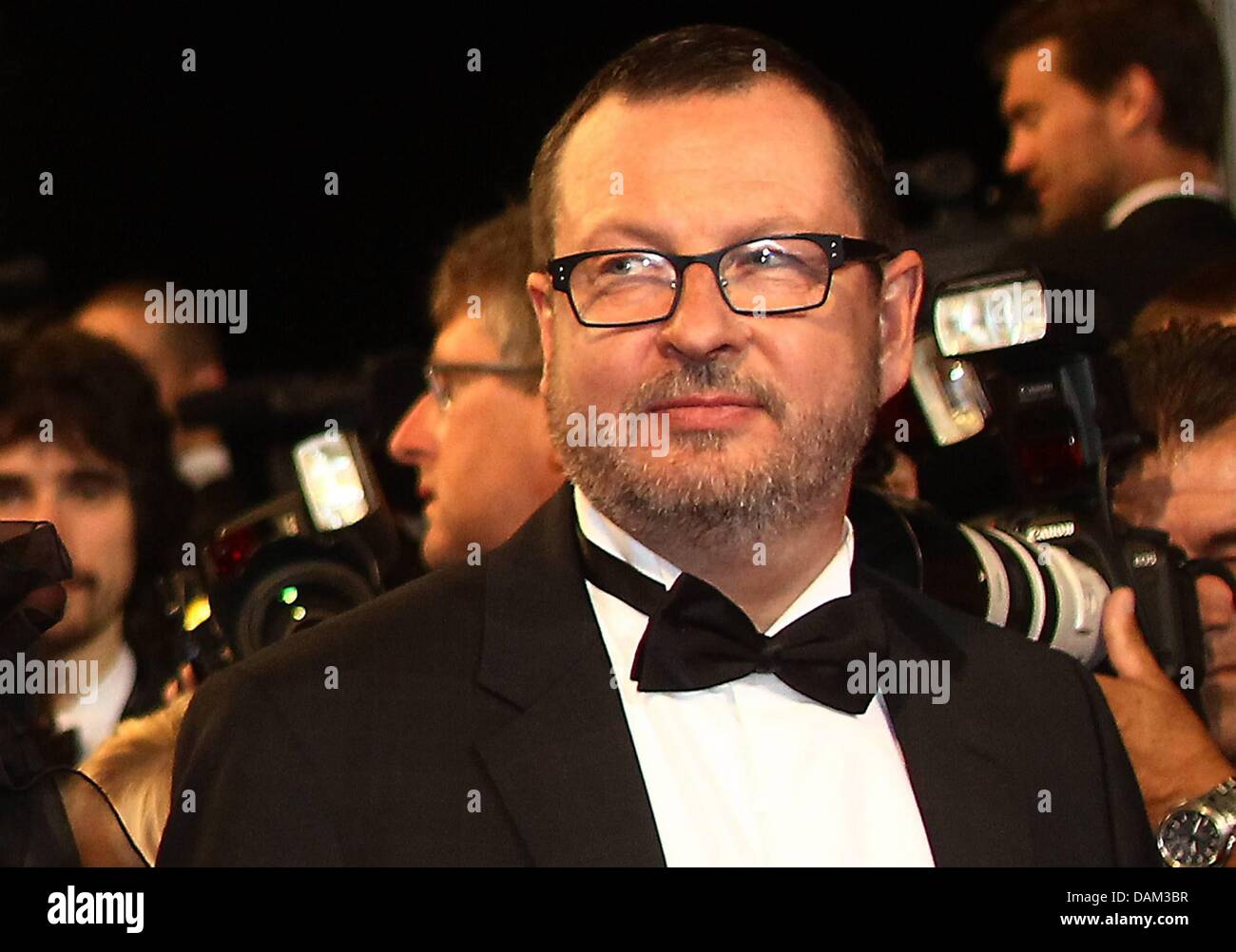 (dpa file) - A file picture dated 18 May 2011 shows Danish director Lars Von Trier arriving for the screening of his movie 'Melancholia' during the 64th Cannes Film Festival, in Cannes, France. Von Trier stirred controversy with remarks about his being a Nazi at a press conference on his movie in Cannes on 18 May 2011. After the press office of the Cannes Film Festival issued a rel Stock Photo