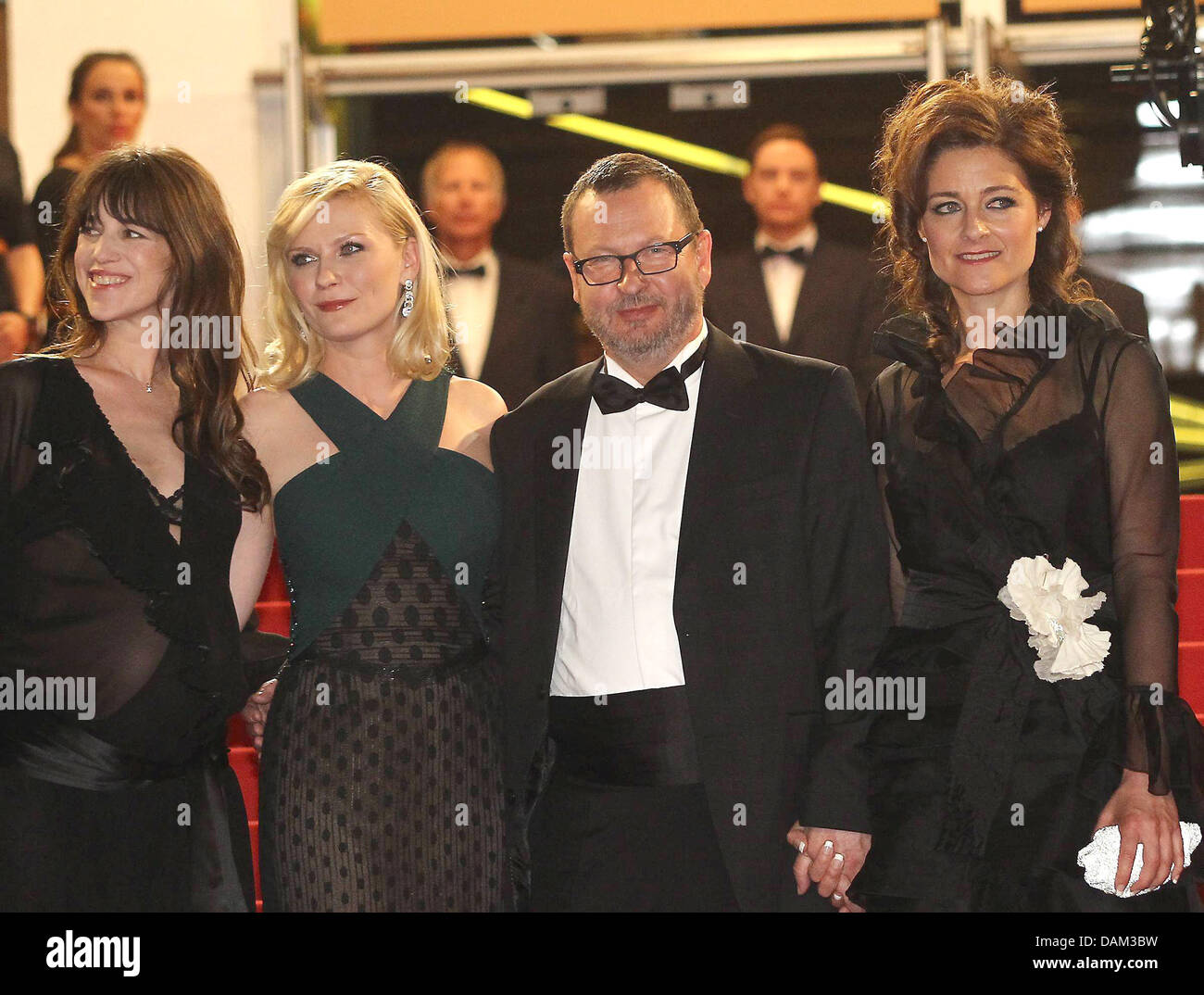 (dpa file) - A file picture dated 18 May 2011 shows Danish director Lars Von Trier (2nd to R) arriving for the screening of his movie 'Melancholia' during the 64th Cannes Film Festival in Cannes, France. Von Trier stirred controversy with remarks about his being a Nazi at a press conference on his movie in Cannes on 18 May 2011. After the press office of the Cannes Film Festival is Stock Photo