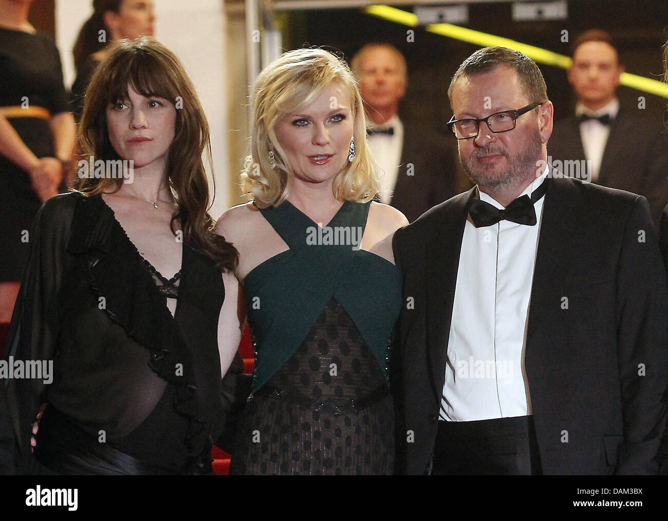 (dpa file) - A file picture dated 18 May 2011 shows Danish director Lars Von Trier (R) arriving for the screening of his movie 'Melancholia' during the 64th Cannes Film Festival in Cannes, France. Von Trier stirred controversy with remarks about his being a Nazi at a press conference on his movie in Cannes on 18 May 2011. After the press office of the Cannes Film Festival issued a  Stock Photo