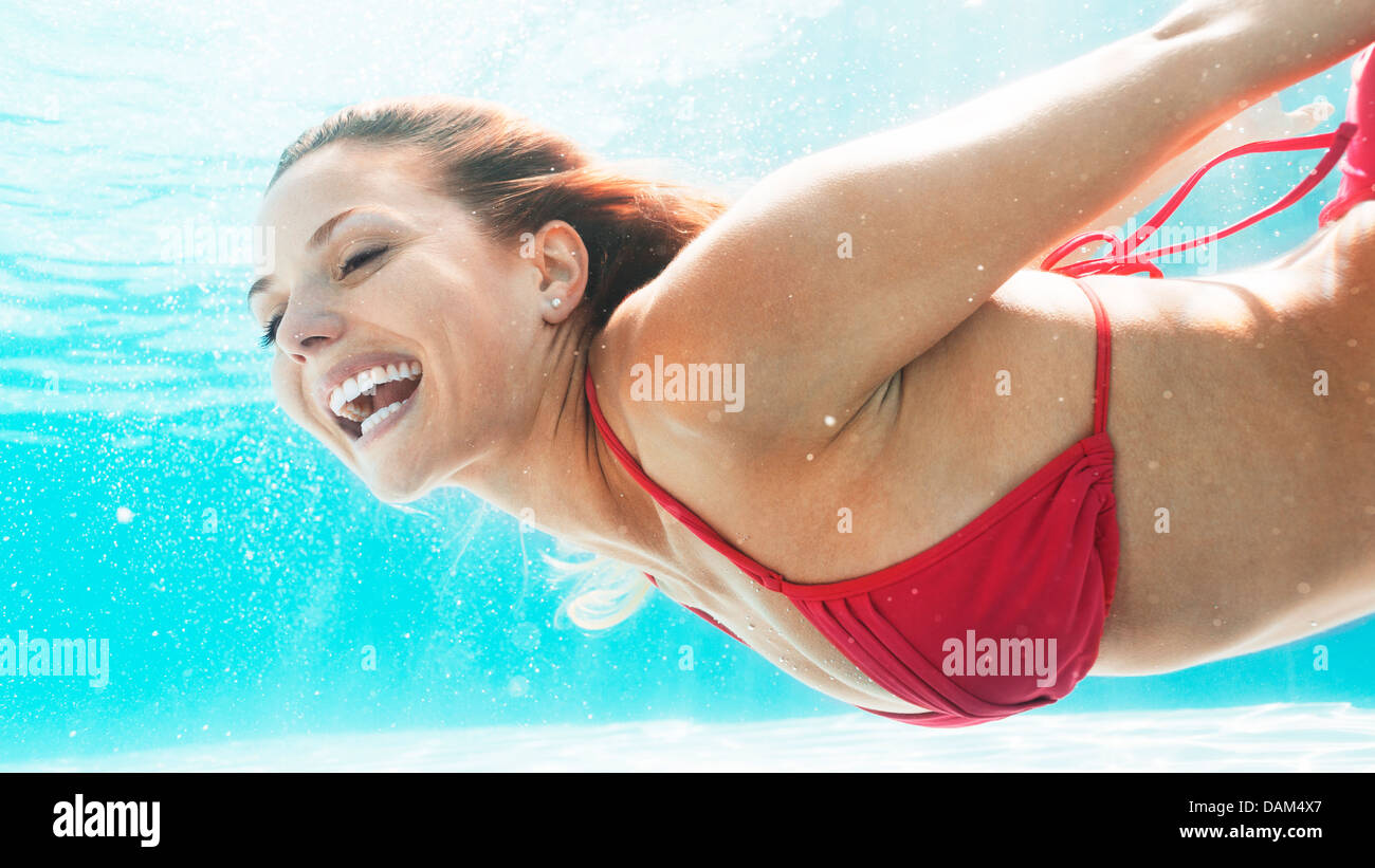 Young woman close up wet pool hi-res stock photography and images