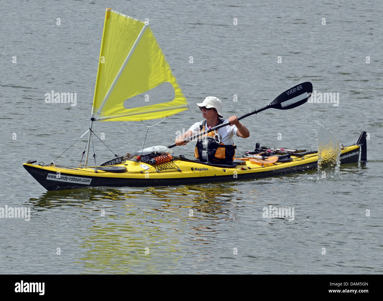 The Australian Sandy Robson paddles on the Donau river in Passau, Germany, 23 May 2011. In paddling from Ulm to Australia - around 50,000 kilometers - the 43-year-old fulfills the dream of her life. Photo: ARMIN WEIGEL Stock Photo