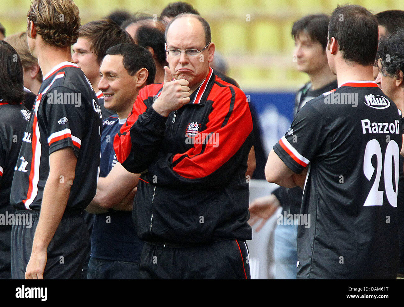 Prince Albert II of Monaco (C) during a charity football match between racing drivers and celebrities prior to the Formula One Grand Prix of Monaco in Monte Carlo, Monaco, 24 May 2011. The Grand Prix will take place on 29 May. Photo: Jens Buettner dpa Stock Photo