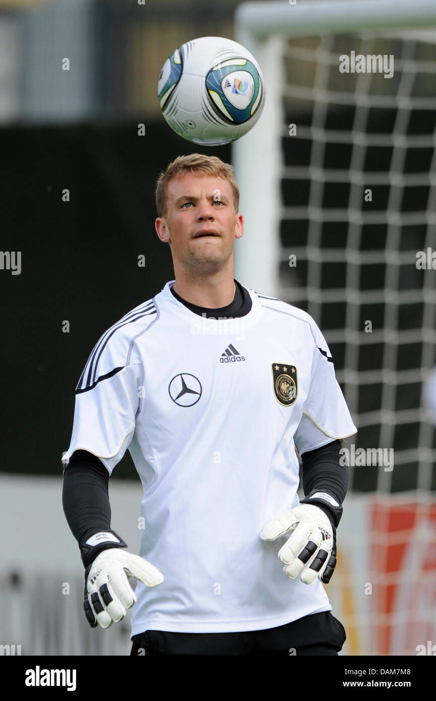 Goalkeeper of the German national soccer team, Manuel Neuer, warms up