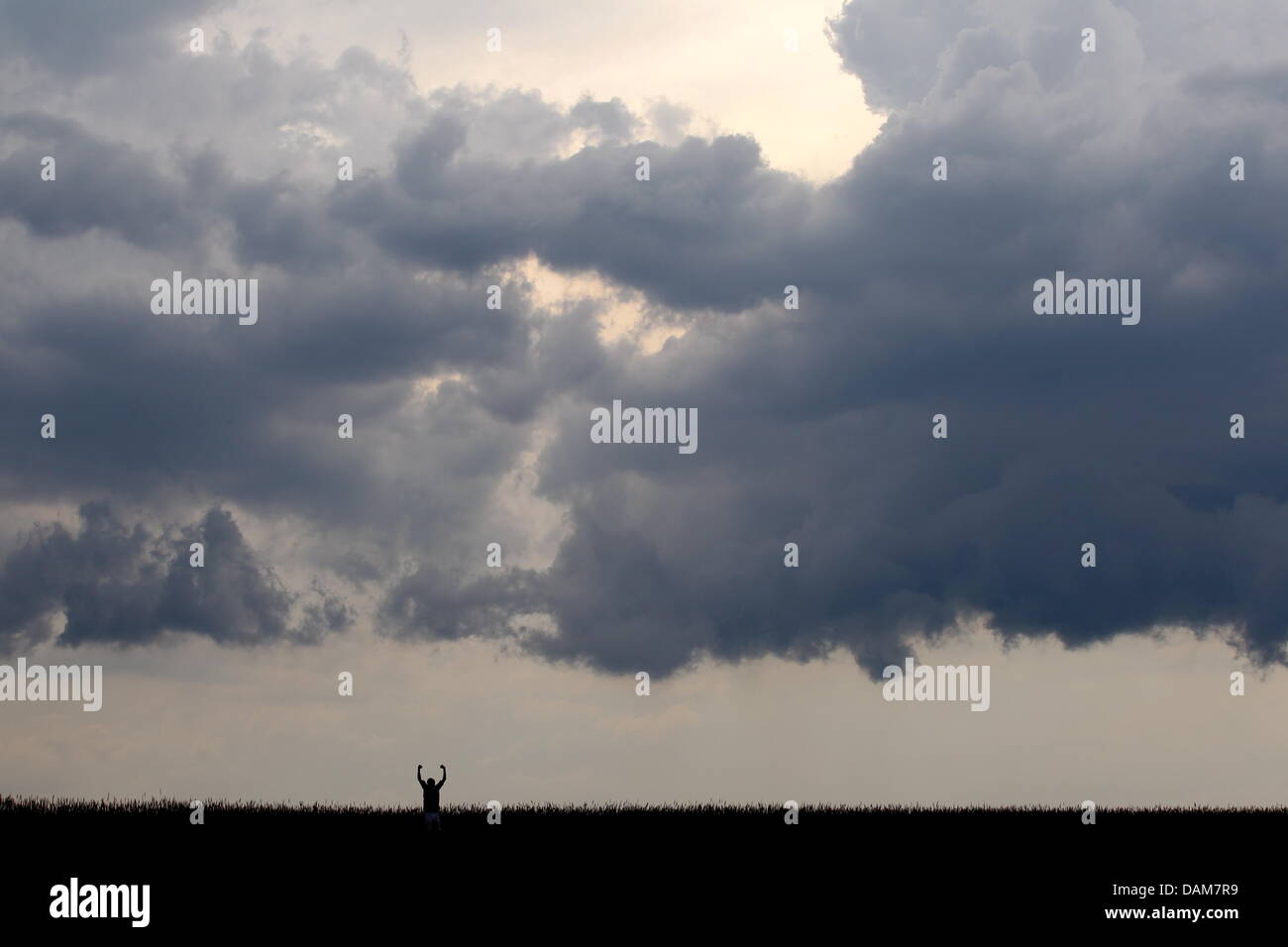 Dark thunderclouds appear above Baierbrunn, Germany, 26 May 2011. Photo: Stephan Jansen Stock Photo