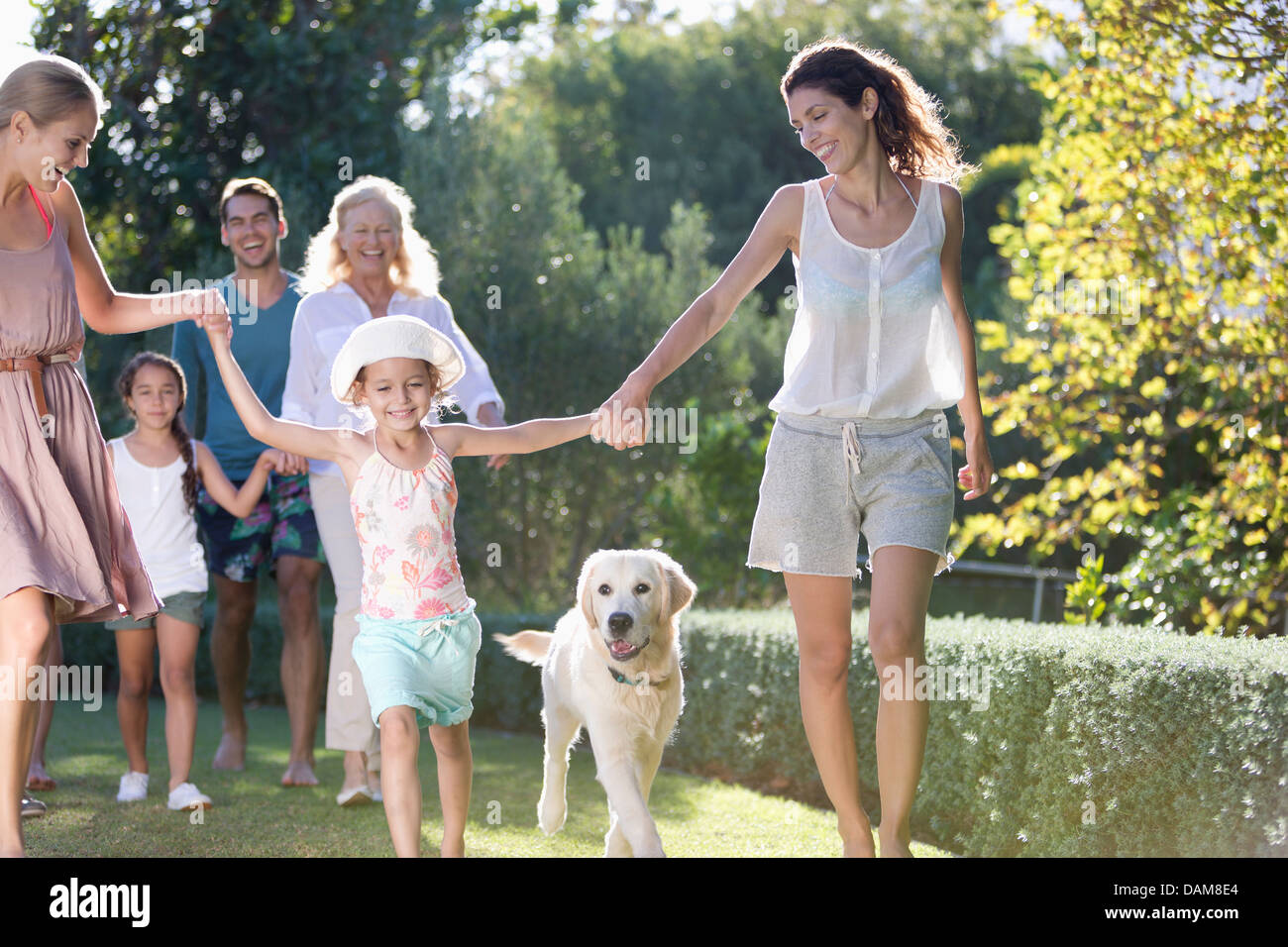Family walking together in park Stock Photo