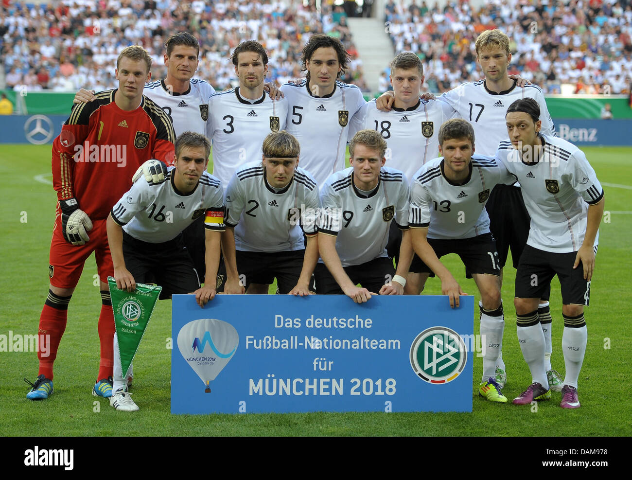 Germany's players (top left to bottom right) Manuel Neuer, Mario Gomez, Arne Friedrich, Mats Hummels, Toni Kroos, Simon Rolfes, Philipp Lahm, Marcel Schmelzer, Andre Schürrle, Thomas Müller and Mesut Oezil pose for a teaqm photo prior to their soccer friendly match Germany vs. Uruguay at Rhein-Neckar-Arena stadium in Sinsheim, Germany, 29 May 2011. Photo: Ronald Wittek Stock Photo