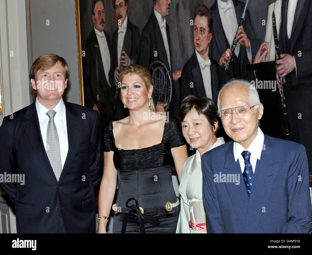 Dutch Crown Prince Willem-Alexander (L)  and Princess Maxima (2nd L) pose with Hisashi Owada, president of the International court, during a concert to commemorate the victims of the earthquake and tsunami in Japan at the concerthall in Amsterdam, 31 May 2011. Photo: Patrick van Katwijk NETHERLANDS OUT Stock Photo