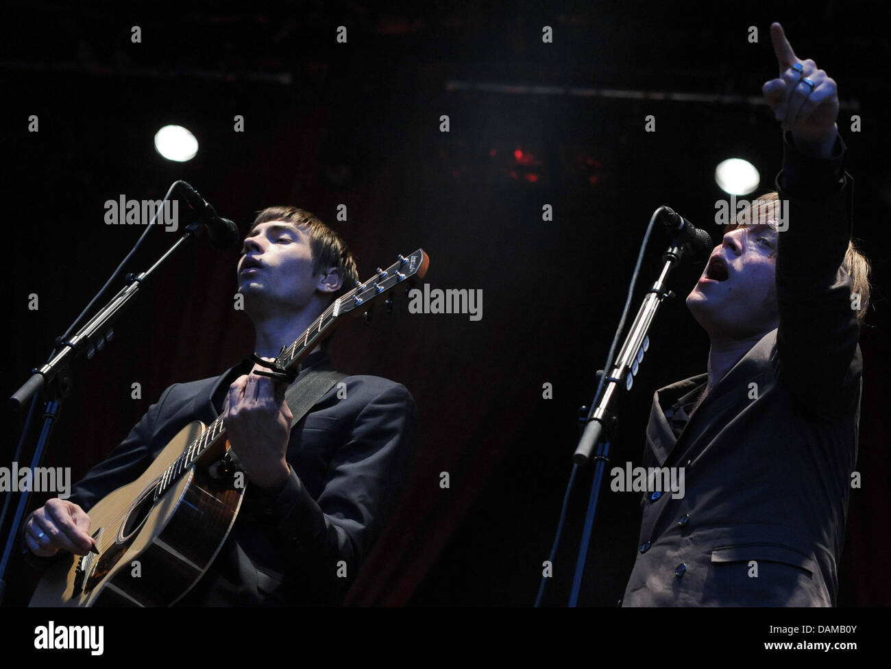 Singers Gustaf Erik Noren (L) and Bjorn Hans-Erik Dixgard (R) of the Swedish rock band 'Mando Diao' give a concert at the Zitadelle in Berlin, Germany, 02 June 2011. The band started their tour through Germany with the concert in Berlin. Photo: Britta Pedersen Stock Photo