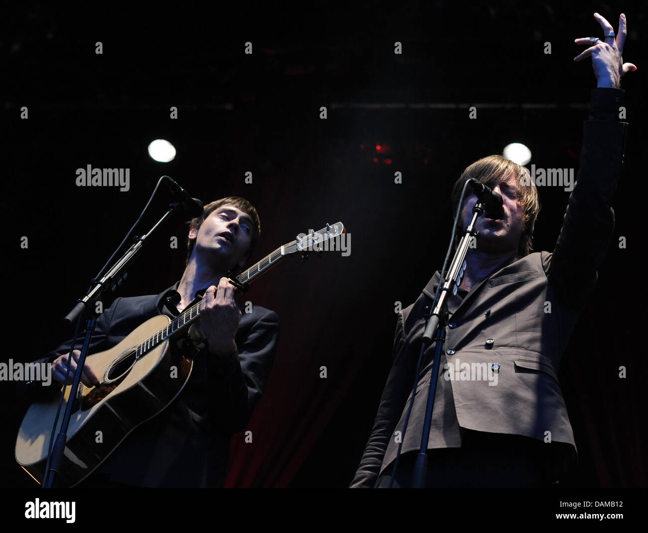 Singers Gustaf Erik Noren (L) and Bjorn Hans-Erik Dixgard (R) of the Swedish rock band 'Mando Diao' give a concert at the Zitadelle in Berlin, Germany, 02 June 2011. The band started their tour through Germany with the concert in Berlin. Photo: Britta Pedersen Stock Photo