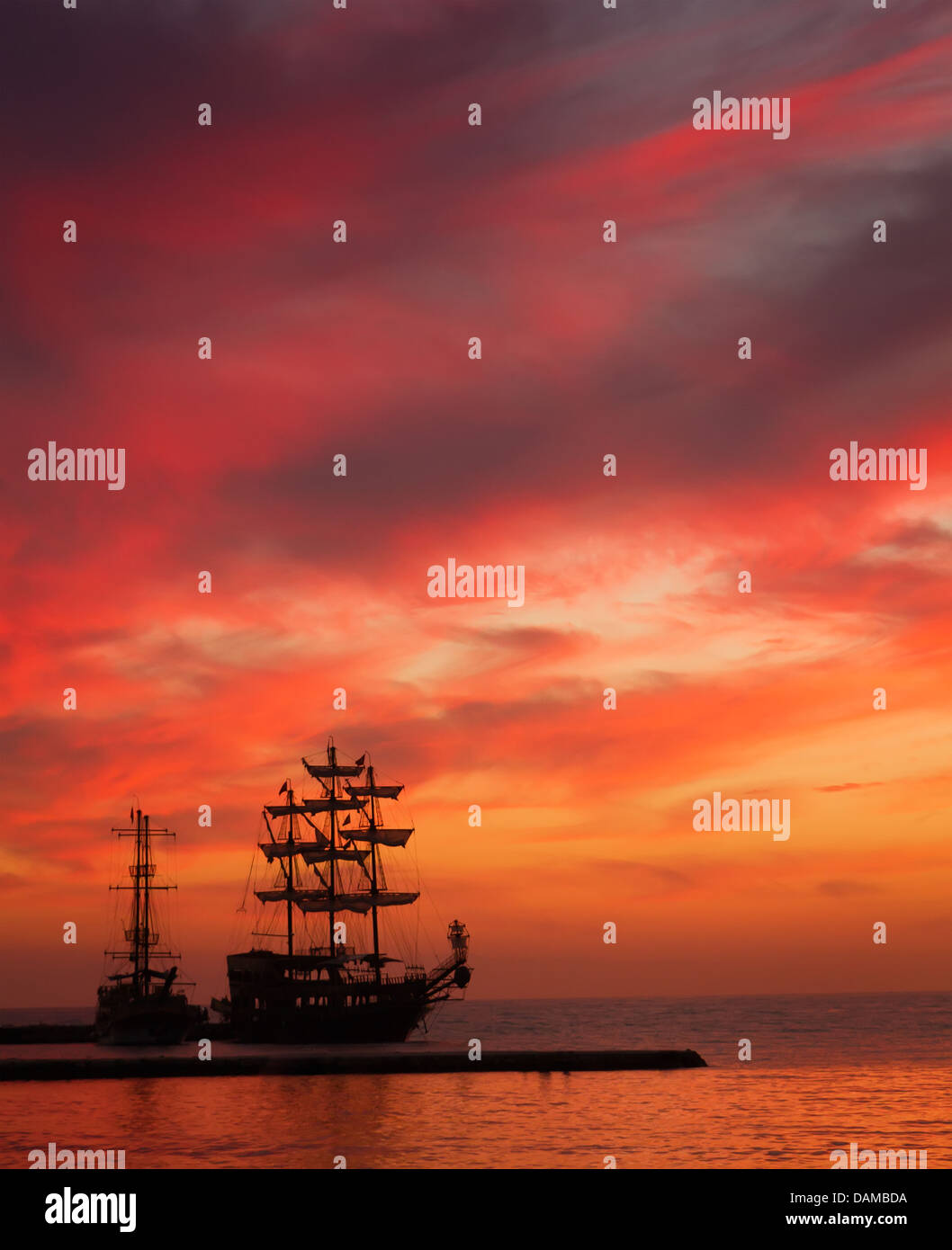 Ship silhouette at sunset Stock Photo - Alamy