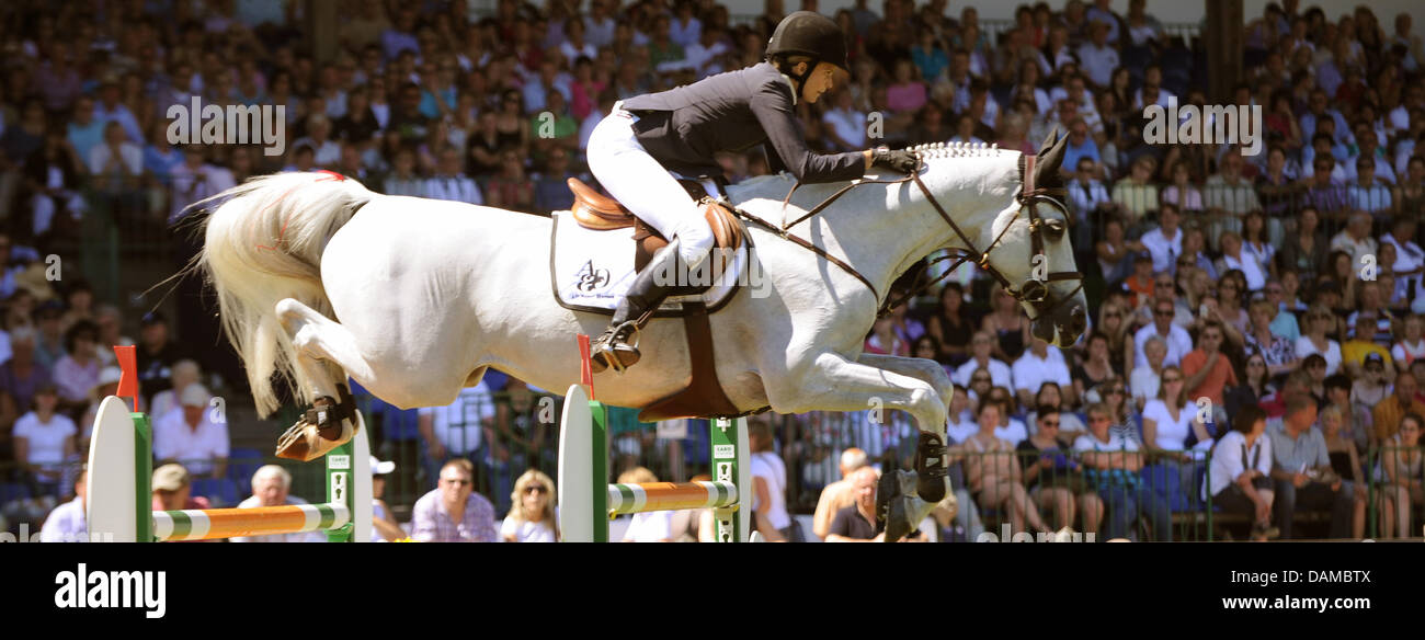 Athina Onassis De Miranda from Greece jumps with her horse AD Crosshill during the Global Champions Tour in Hamburg, Germany, 05 June 2011. Show jumping at the Global Champions Tour is endowed with a 285,000 euro prize. Photo: ANGELIKA WARMUTH Stock Photo