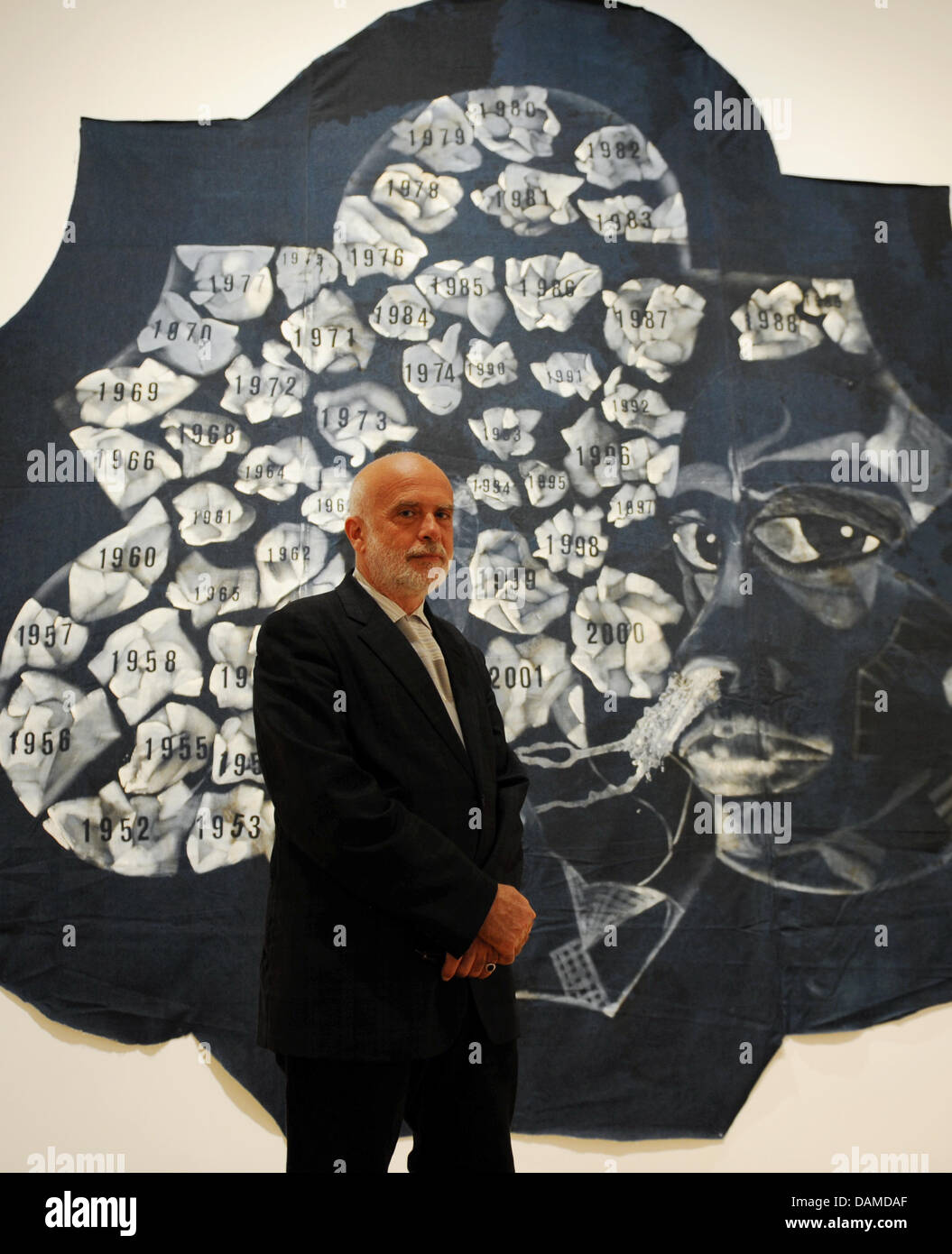 At the preview of the exhibiton 'Francesco Clemente. Palimpsest' the Italian painter Francesco Clemente, who is living in New York, stands in front of his work 'Birthday Self-portrait' (2001) inside the Art hall Schirn in Frankfurt/main, Germany, 7 June 2011.  The Schirn presents around 40 pieces from the years 1978 to 2011 from 8 June to 4 September 2011. The exhibition concentrat Stock Photo
