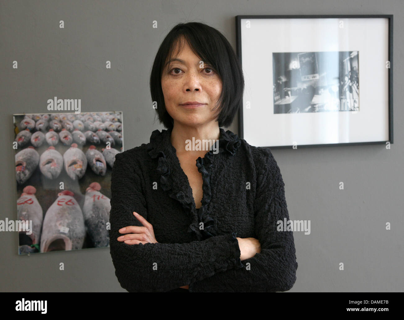 Japanese-Swiss artist Leiko Ikemura stands at the Kunstwerke art gallery in Berlin, Germany, 8 June 2011. About 100 days after the tsunami catastrophe in Japan, the exhibition 'Breaking News' offers an artistic approch to it. It will be open until 17 July. Photo: Stephanie Pilick Stock Photo