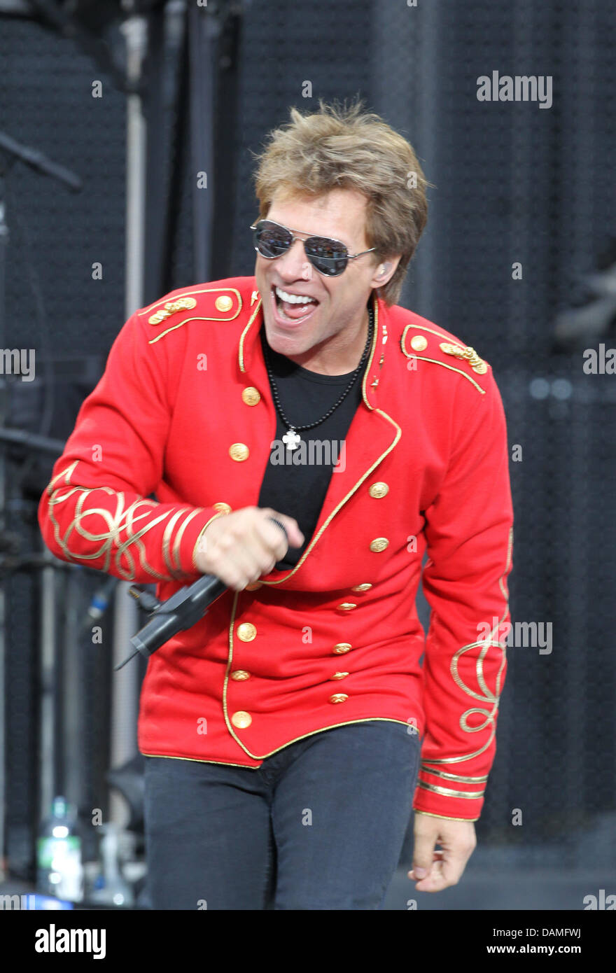 US band Bon Jovi with lead singer Jon Bon Jovi performs at the Olympic Stadium in Munich, Germany, 12 June 2011. The concert can be seen all over the world through live streaming. Photo: Felix Hoerhager Stock Photo