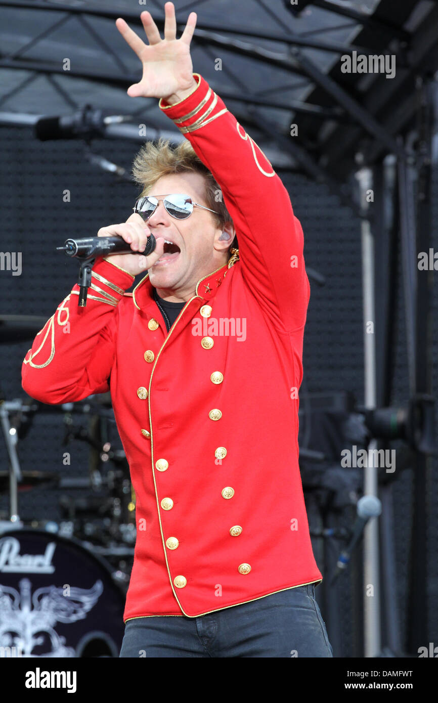 US band Bon Jovi with lead singer Jon Bon Jovi performs at the Olympic Stadium in Munich, Germany, 12 June 2011. The concert can be seen all over the world through live streaming. Photo: Felix Hoerhager Stock Photo