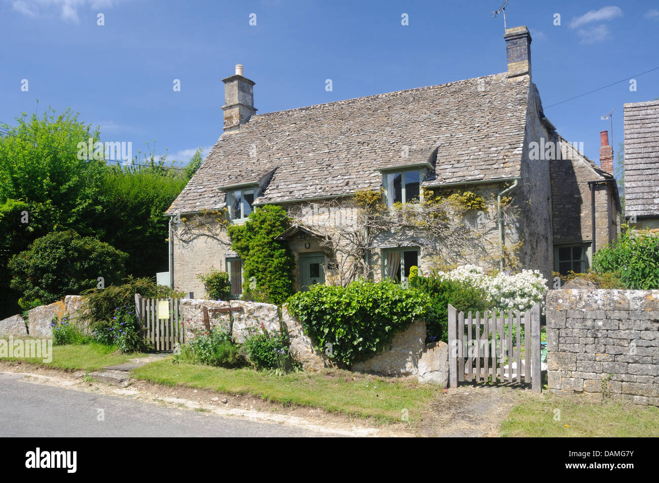 The Cottage, an early 17th c. stone Cotswold cottage in Fifield, Oxfordshire, England Stock