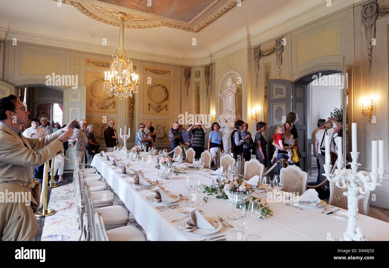 The table in the garden hall is aesthetically decorated in Meseberg Palace in Meseberg, Germany, 18 June 2011. The Palace, that is used as guests' house by the federal gouvernment since 2007, had invited for an Open House day. Photo: BERND SETTNIK Stock Photo