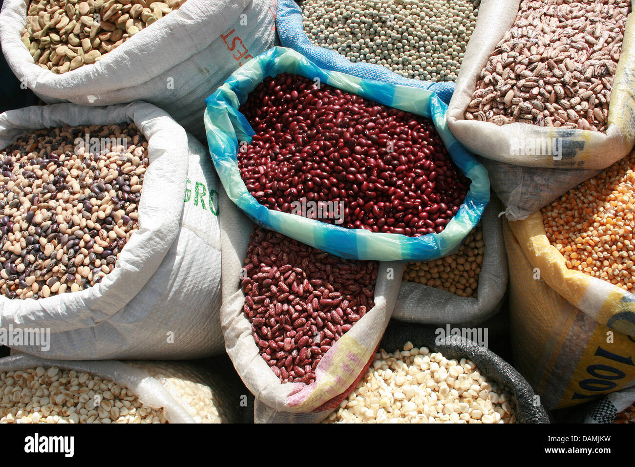 Sacks of fresh corn, beans and seeds for sale at the outdoor food