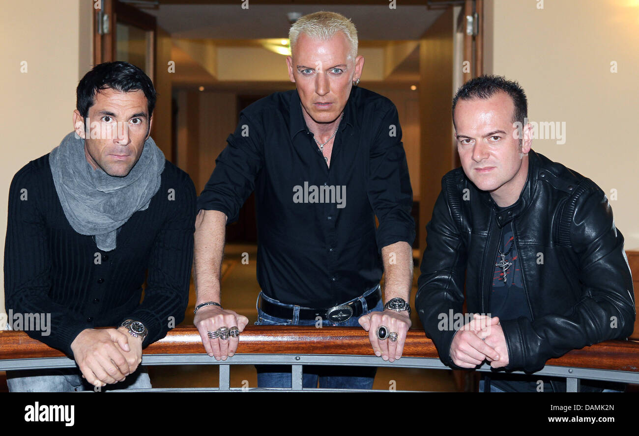 Scooter's electro drummer Michael Simon (LR), singer H. P. Baxxter and