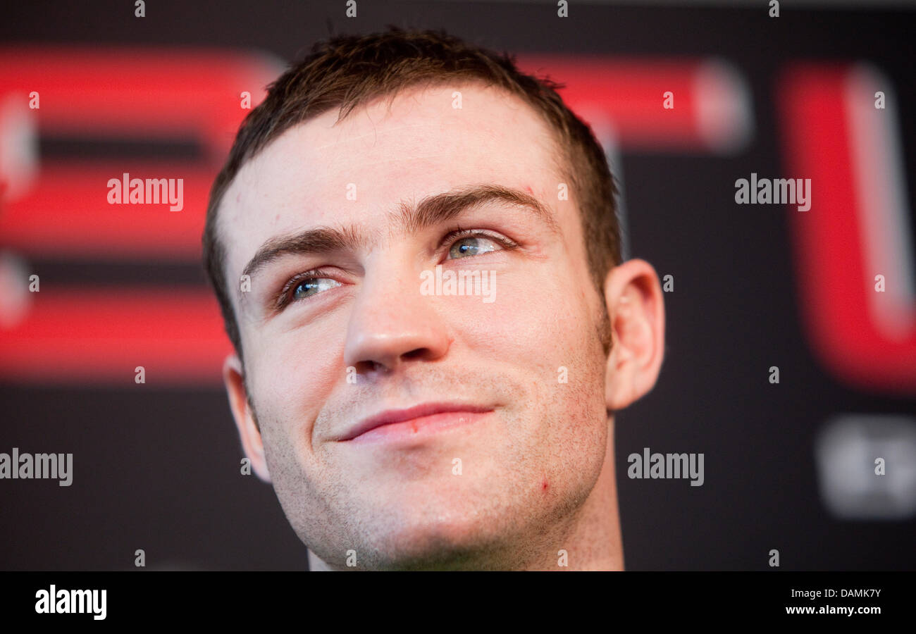 Irish boxer Matthew Macklin smiles at a press conference of Sturm