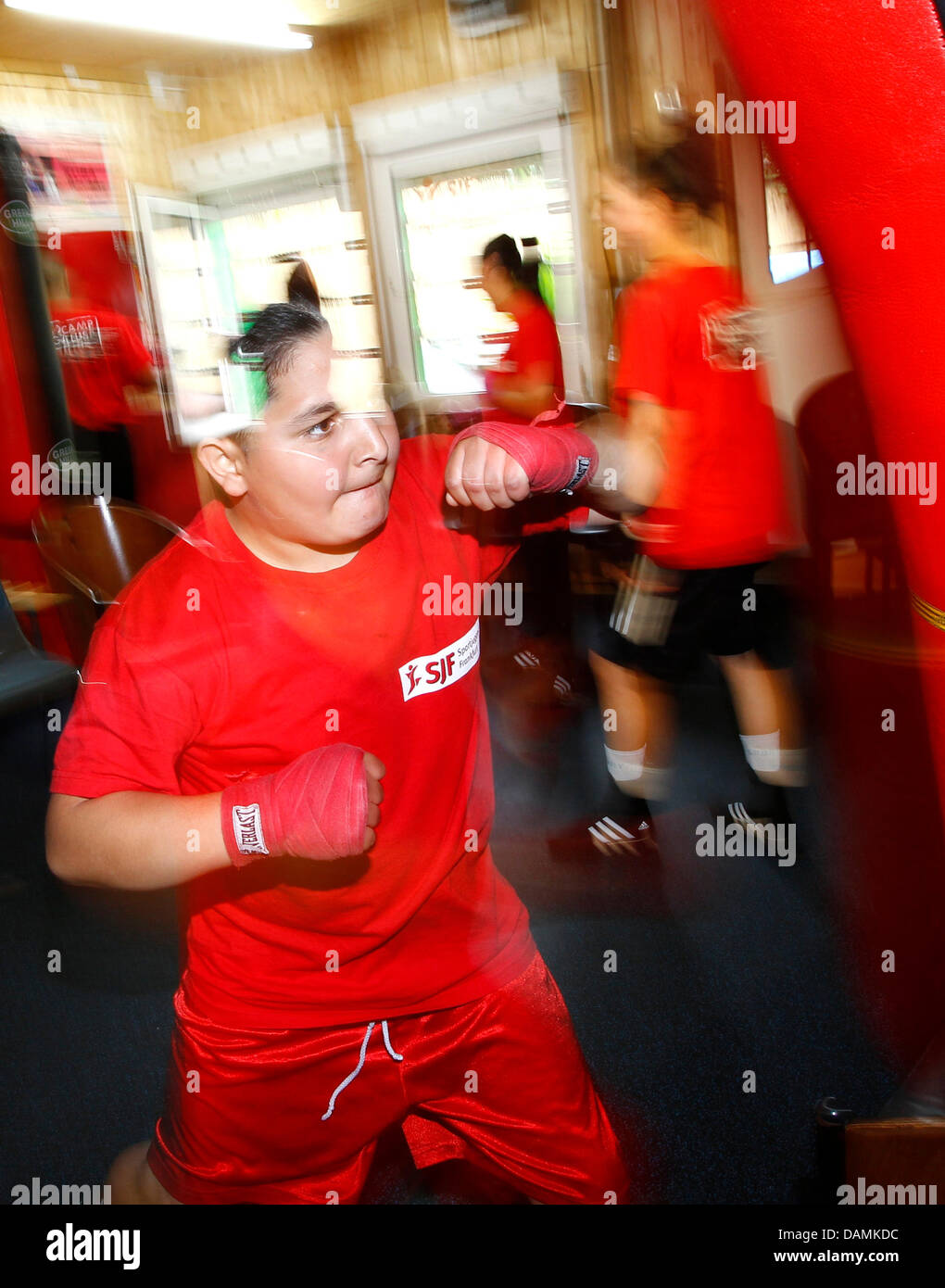 A young man works out at a youth sports centre in Frankfurt am Main