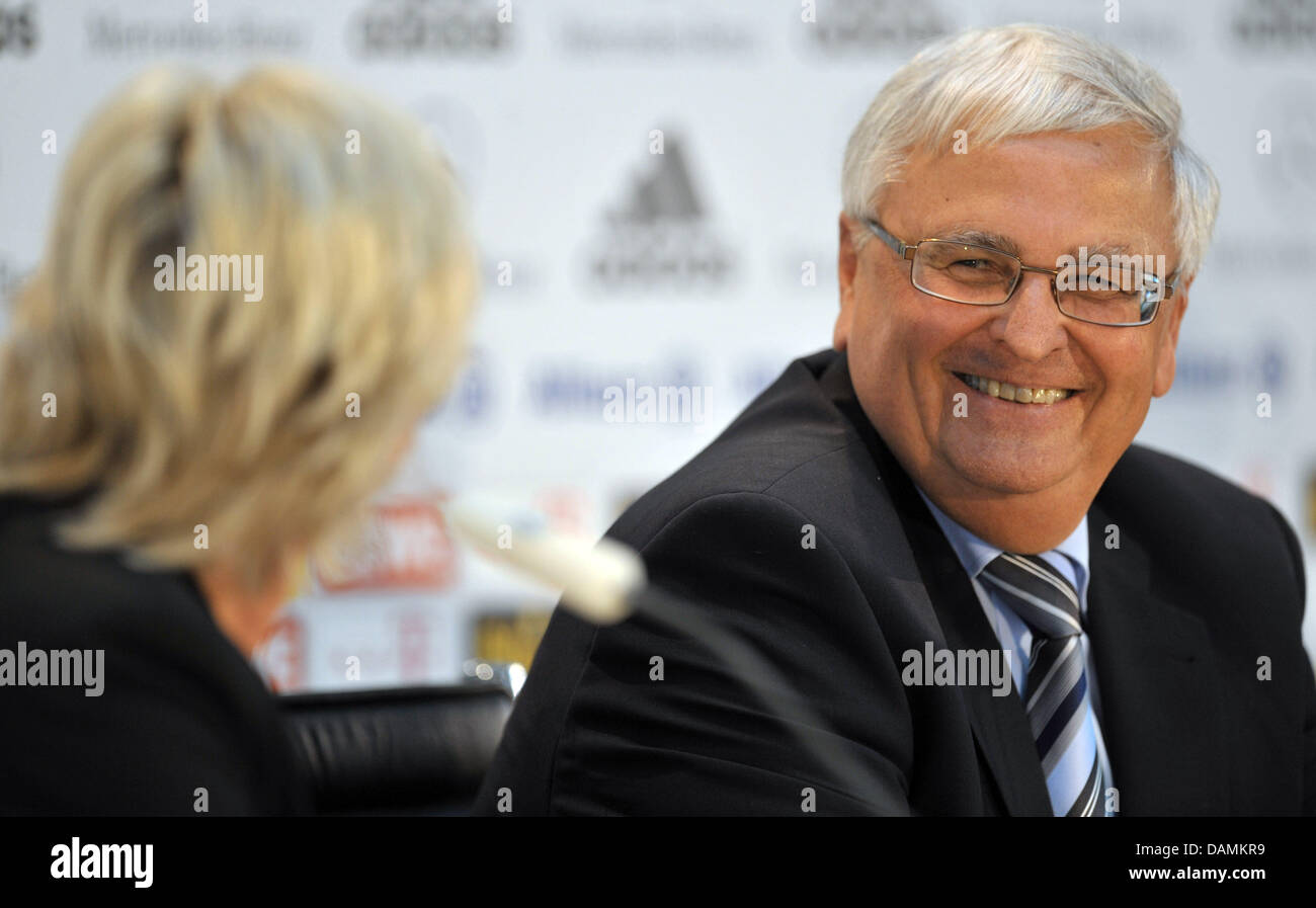 German women's soccer national coach Silvia Neid (L) and German Football Association (DFB) President Theo Zwanziger (R) attend a press conference in Berlin, Germany, 21 June 2011. Silvia Neid will remain coach of the German women's soccer team until 2016. The contract of the 47-year-old was extended for three more years, the German Football Association DFB disclosed five days befor Stock Photo