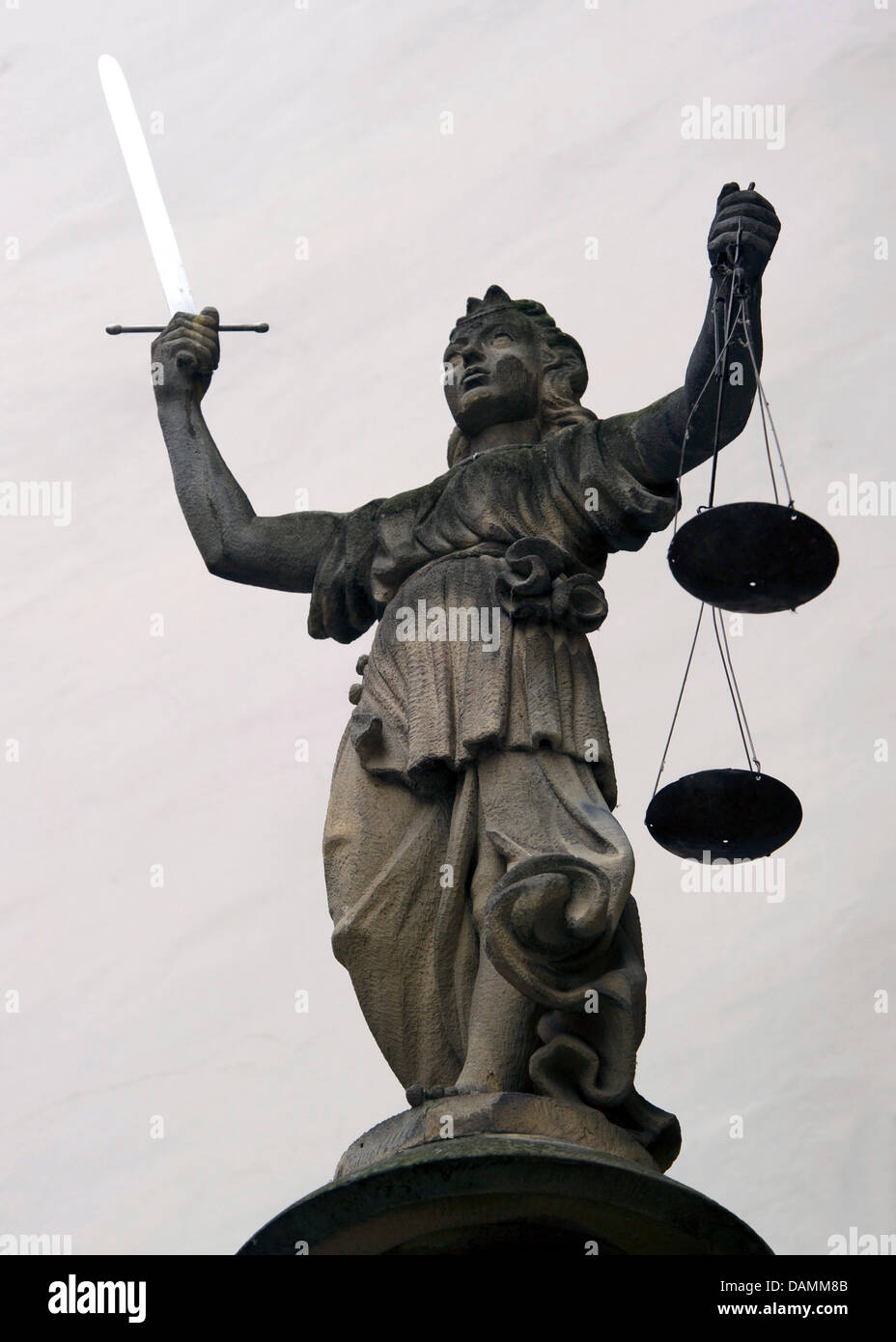 Justitia from 1591 stands at the entrance of the court wind at the city hall in Goerlitz, Germany, 21 June 2011. Photo: Arno Burgi Stock Photo