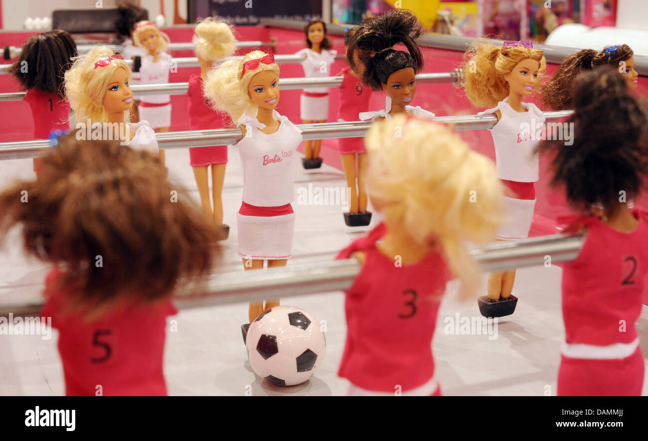 The 20,000 euro special edition of a Barbie doll table soccer stands at the shopping centre KaDeWe in Berlin, Germany, 23 June 2011. On occasion of the upcoming FIFA Women's World Cup, a toy manufacturer's over-sized table soccer has been christened 'Barbie loves DFB' (German Football Association). Photo: Rainer Jensen Stock Photo