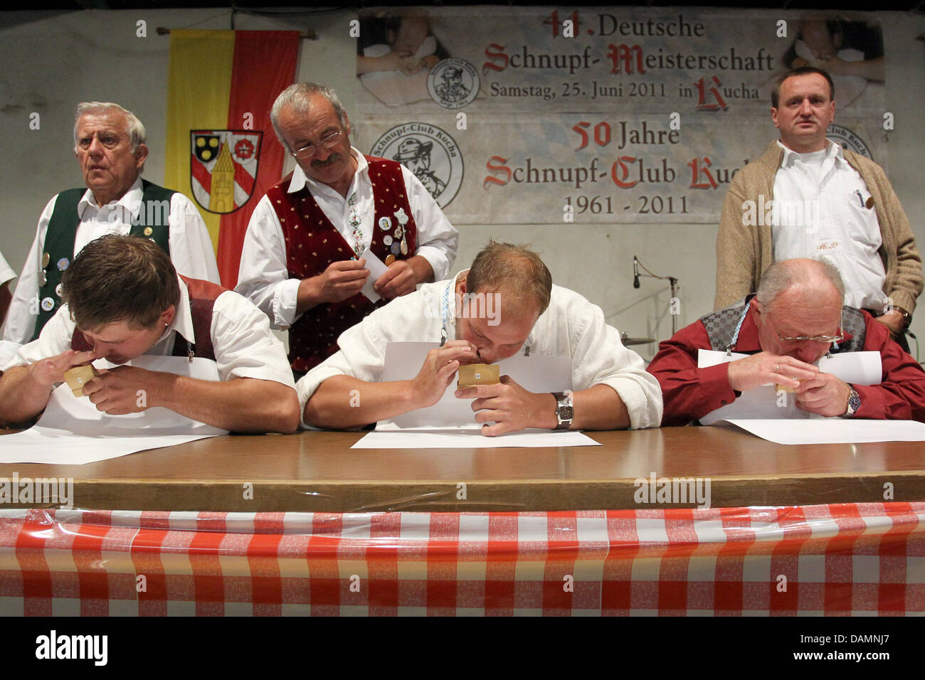 german sniffing tobacco Contestants stuff tobacco into their nose during the 44th German snuff  tobacco championship in Kucha, Germany, 25 June 2011. The aim is to sniff  as much tabocco as possible from a tobacco