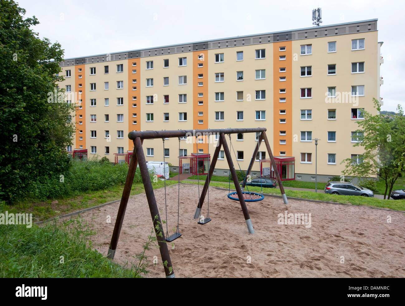 The playground is empty in front of the home of murdered seven-year-old Mary-Jane in Zella-Mehlis, Germany, 26 June 2011. Mary-Jane has been killed by an unknown perpetrator. Just one day after her disappearance her dead body has been found inside a creek 1.5 kilometers off of her mother's apartment. Photo: Michael Reichel Stock Photo