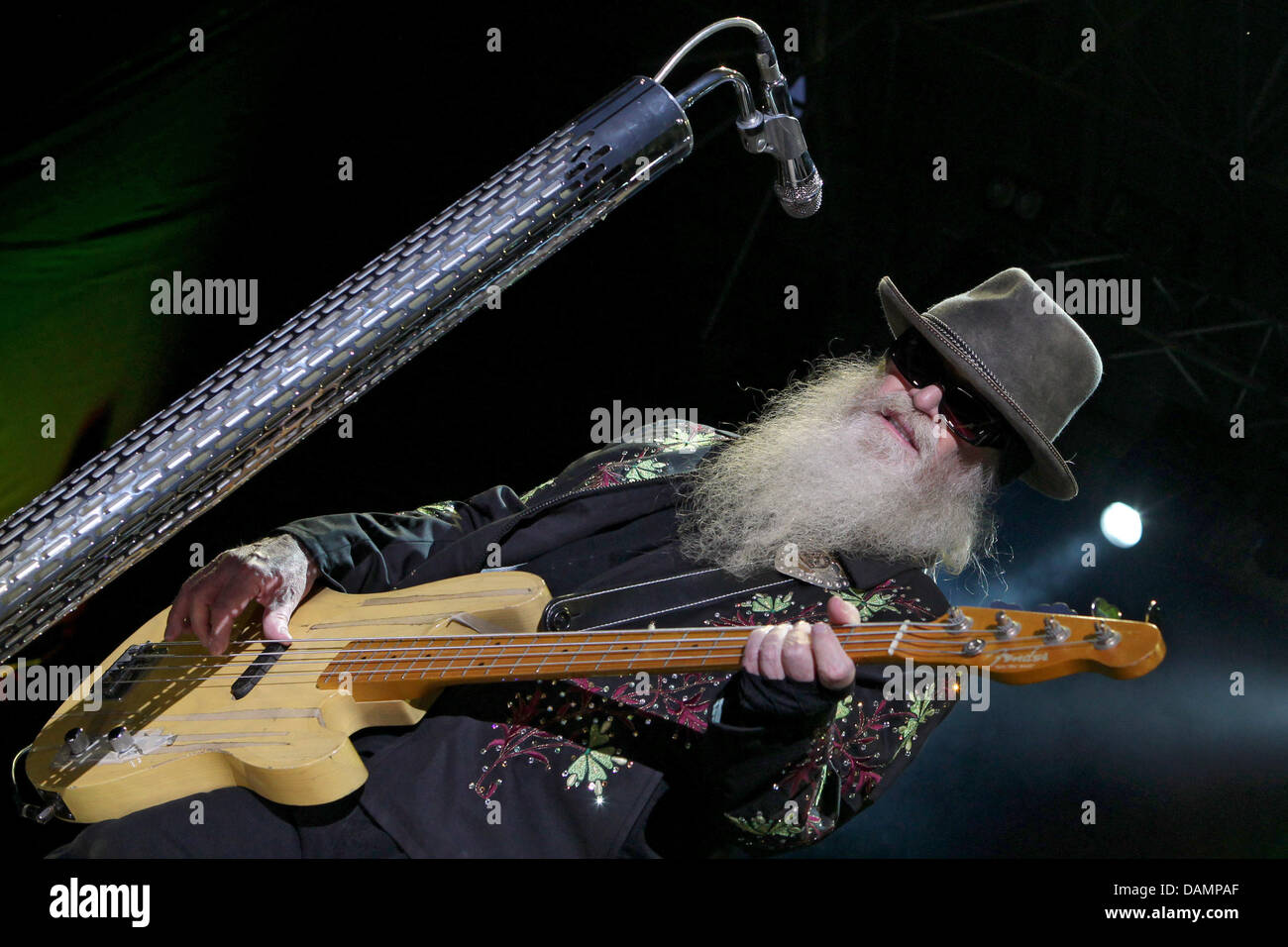 Bassist of the US American band ZZ Top, Dusty Hill, performs at