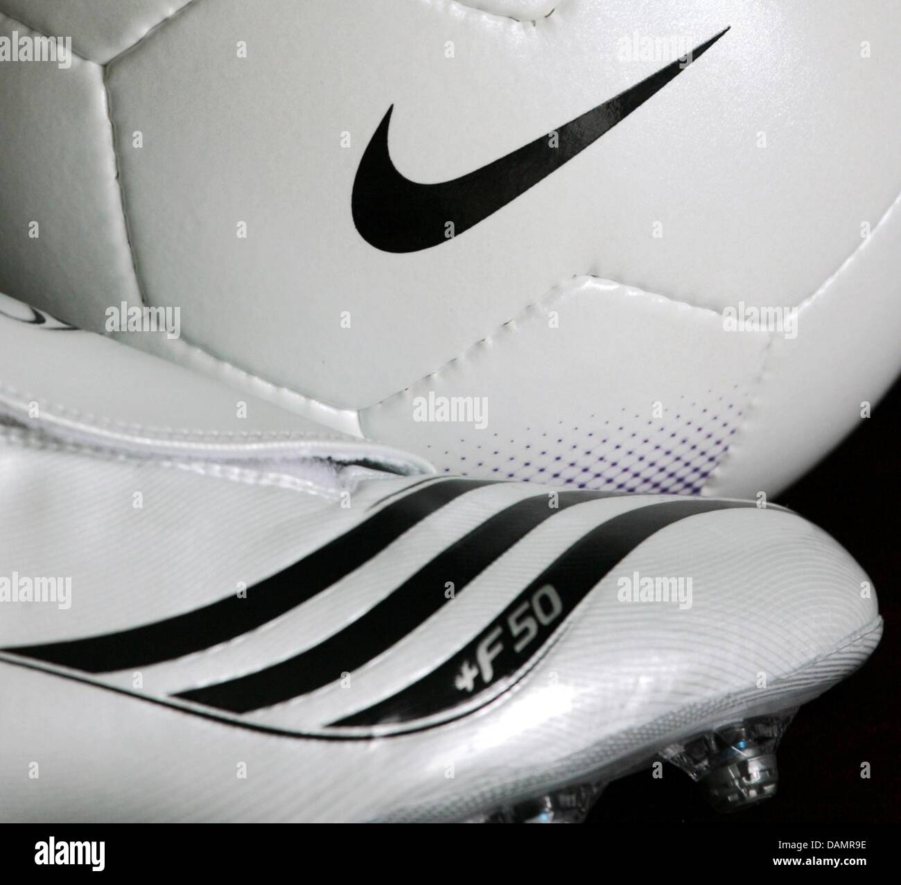 Grumpy Susteen Drama dpa file) - A file picture dated 22 March 2007 of an adidas soccer shoe  standing next to a Nike ball in Duesseldorf, Germany. In their race for the  World's number one
