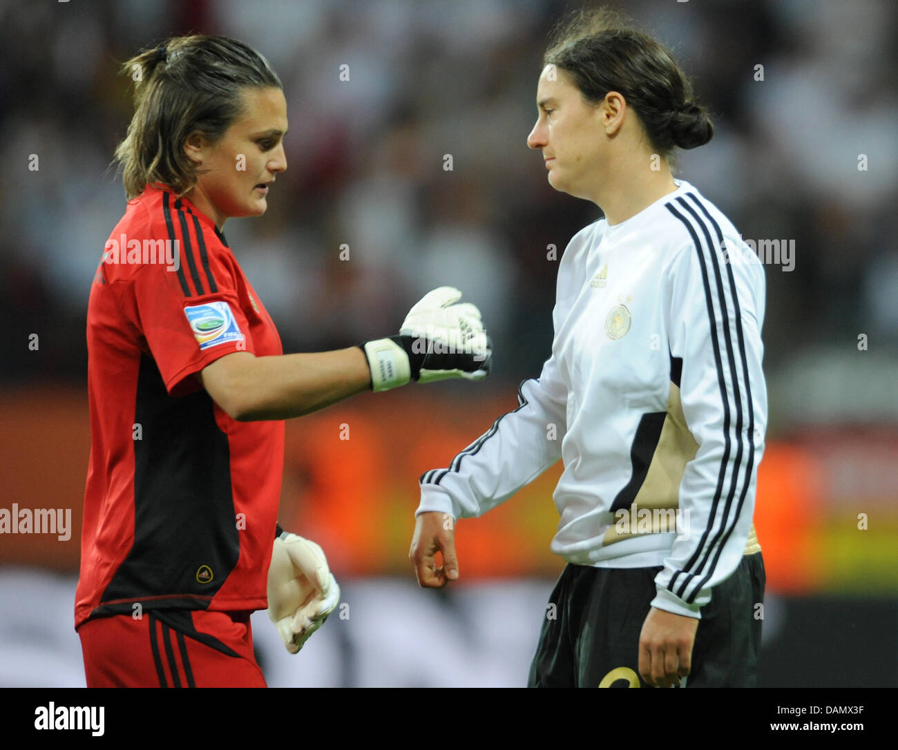 Germany's goalkeeper Nadine Angerer (L) and Birgit Prinz after the Group A match Germany against Nigeria of FIFA Women's World Cup soccer tournament at the FIFA Women's World Cup Stadium in Frankfurt, Germany, 30 June 2011. Foto: Arne Dedert dpa/lhe  +++(c) dpa - Bildfunk+++ Stock Photo